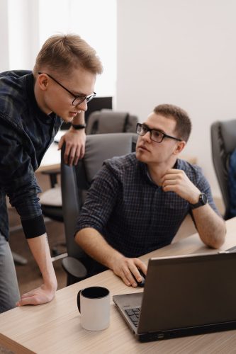 group-young-business-people-working-office-min